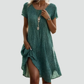 Light midi dress with polka dots and relaxed fit