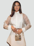 Elegant damesoverhemd van organza met pofmouwen