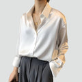 Loose women's satin shirt with long sleeves
