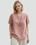 Loose women's linen blouse with short sleeves and buttons