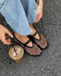 Women's mesh ballet flats with a strap and leather details
