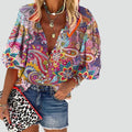 Colorful women's boho blouse with patterns and V-neckline for summer