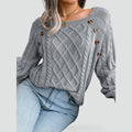 Pull élégant pour femme avec boutons et motif