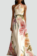 Robe maxi à motif floral, parfaite pour un mariage.