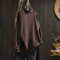 Women's oversized wool sweater with long sleeves for winter