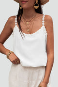 Women's top with floral trim, perfect for any occasion