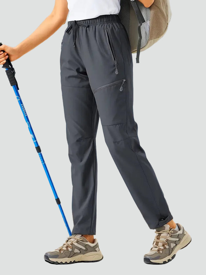 Damskie sportowe spodnie trekkingowe z kieszeniami na zamek