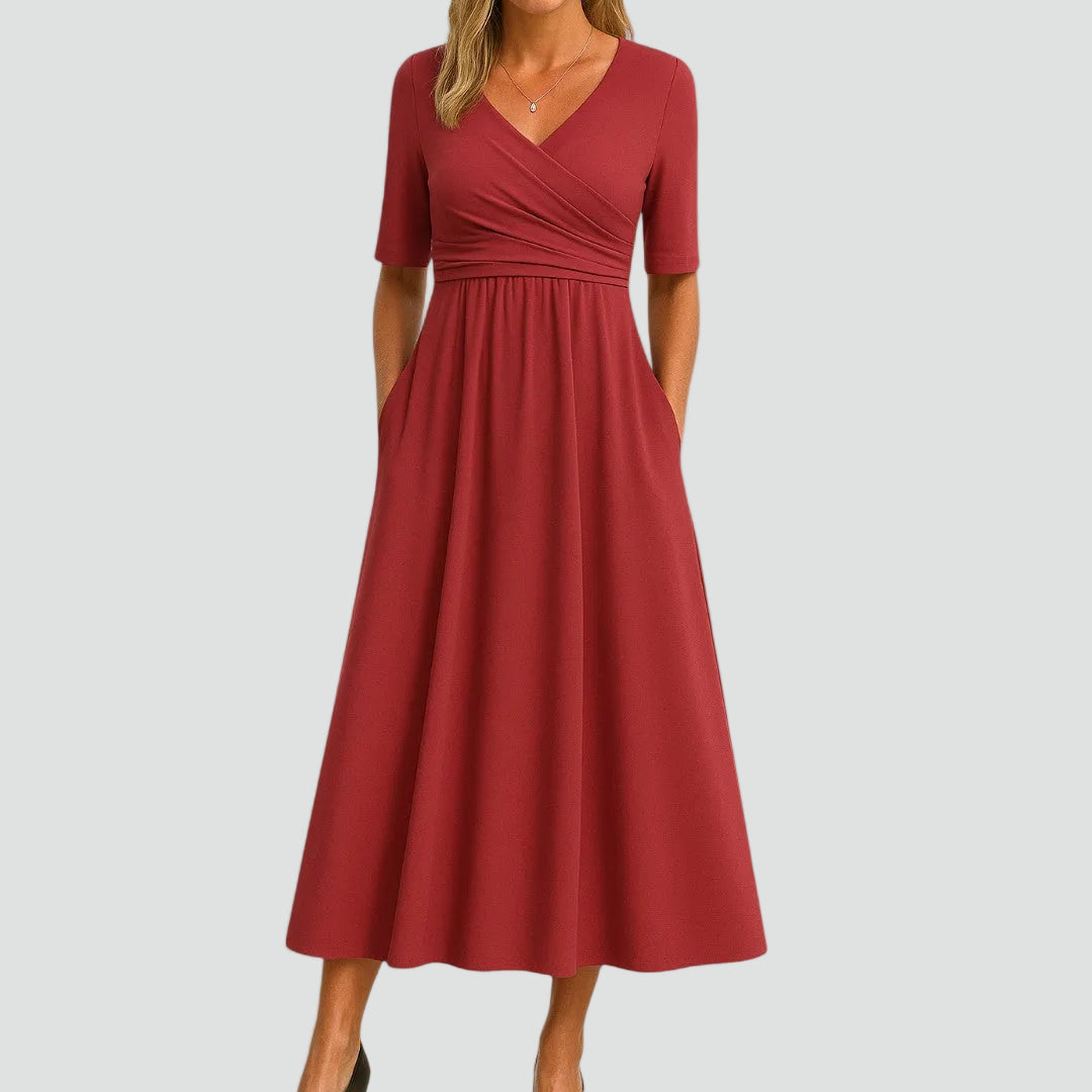 Sukienka midi koktajlowa z kopertowym dekoltem i kieszeniami