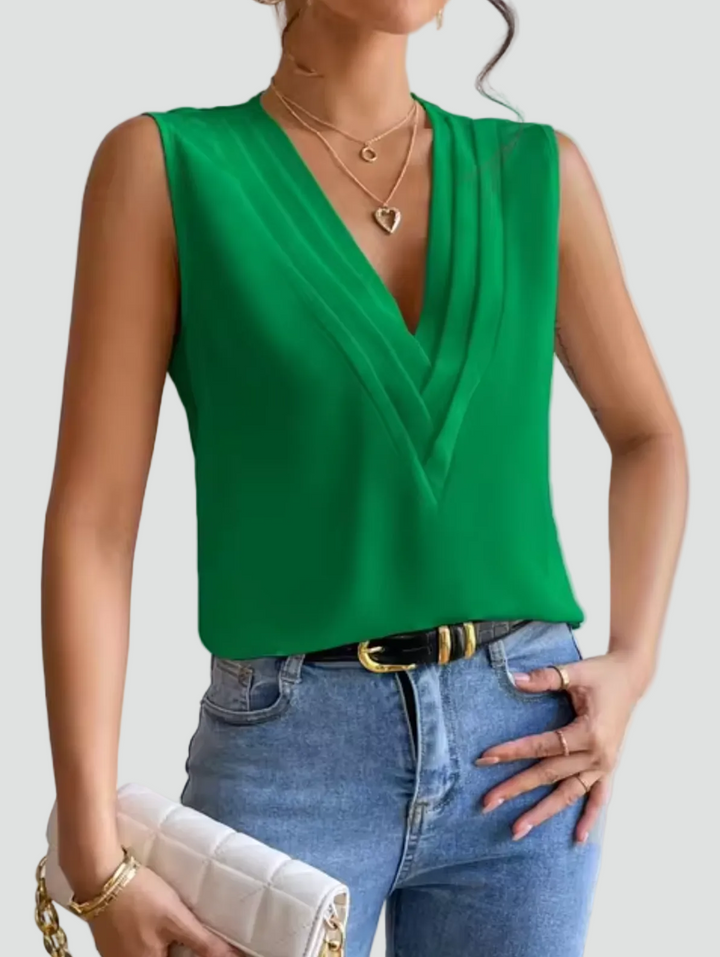 Elegant sleeveless blouse with a wrap neckline