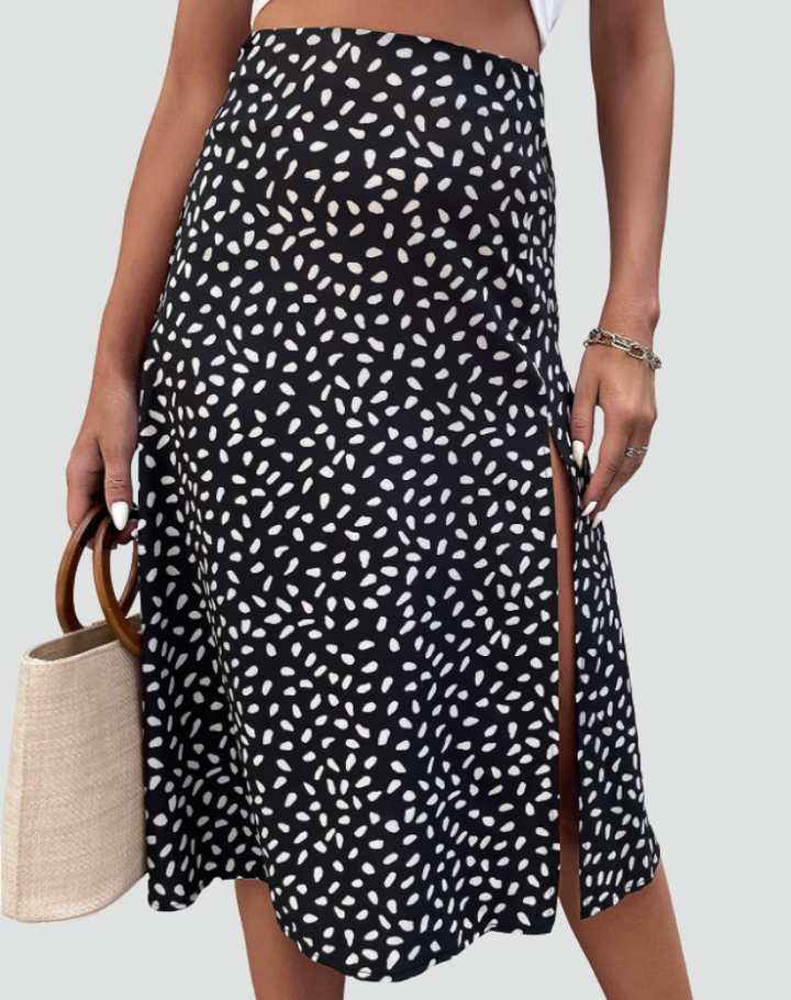 Zomerse midi wikkelrok met patronen en strikdetail