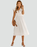 Midi dress with ruffles and pleated hem with belt