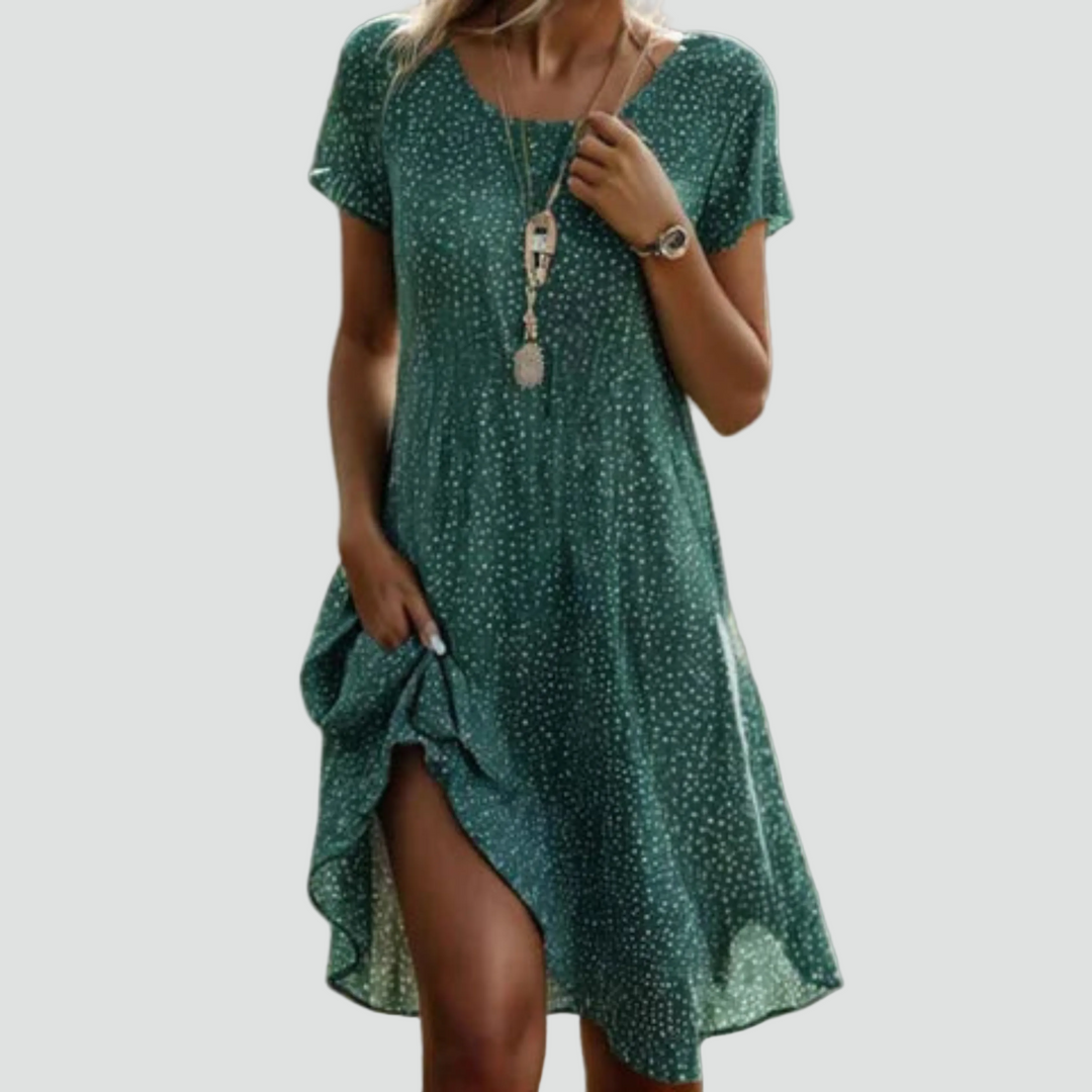 Midi partyjurk in groen met kleine print en korte mouwen