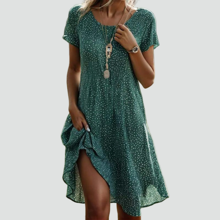 Midi partyjurk in groen met kleine print en korte mouwen