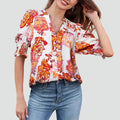 Floral blouse with V-neck and puff sleeve