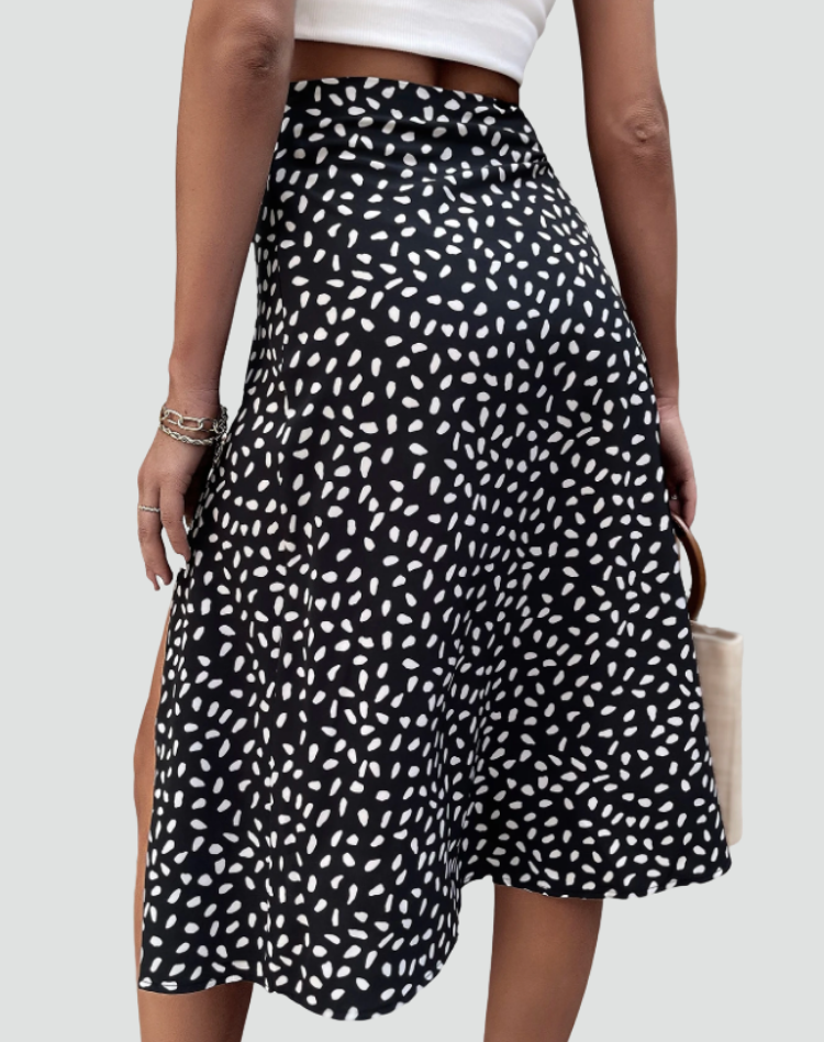 Zomerse midi wikkelrok met patronen en strikdetail