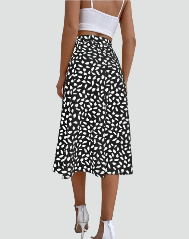 Zomerse midi wikkelrok met patronen en strikdetail