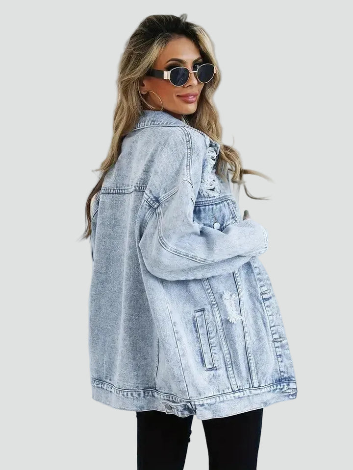 Oversized women's denim jacket with distressing for everyday wear
