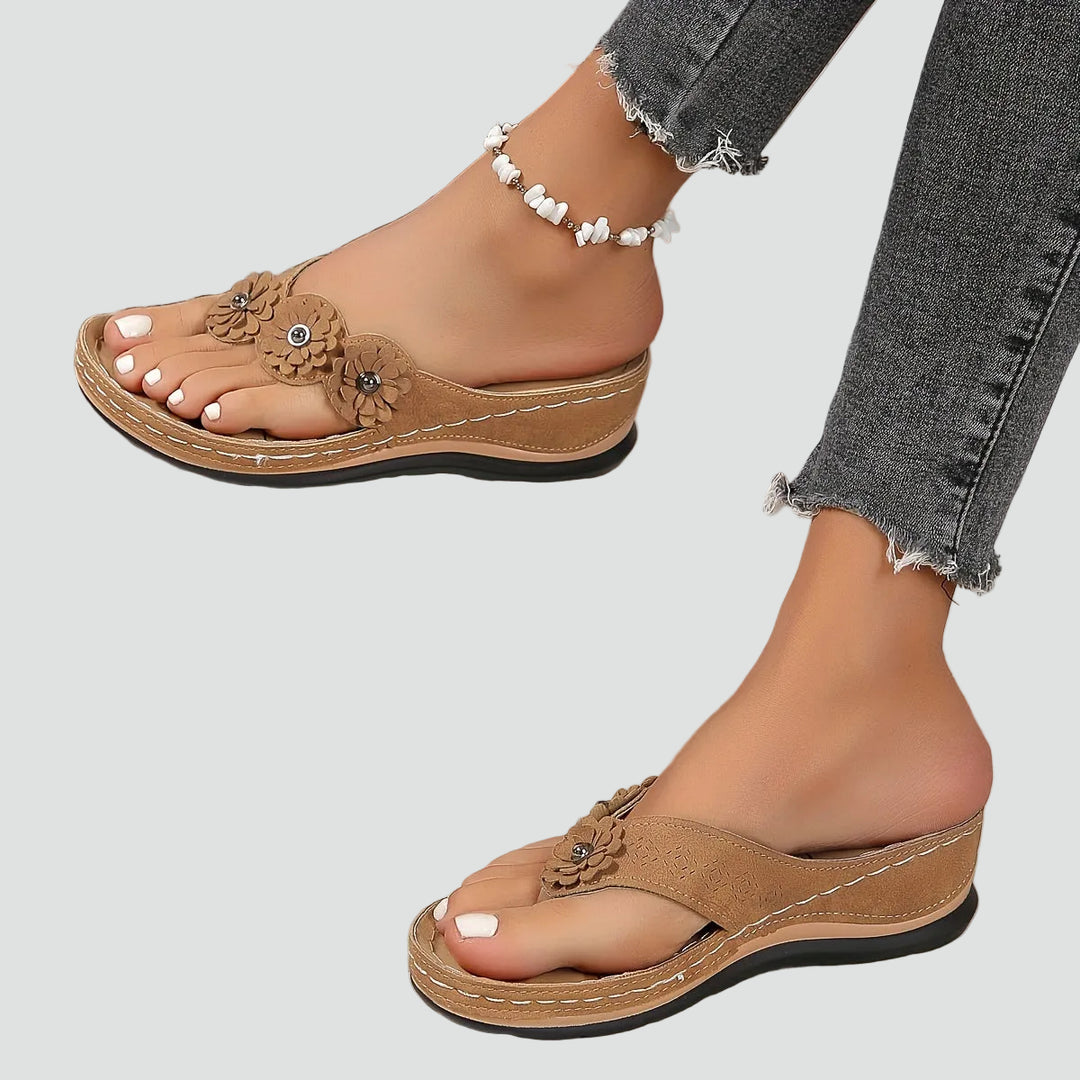 Wedge sandals with floral applique and comfortable design
