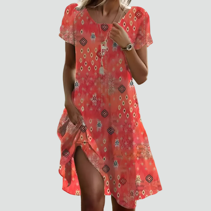 Robe midi fluide à pois avec une coupe décontractée