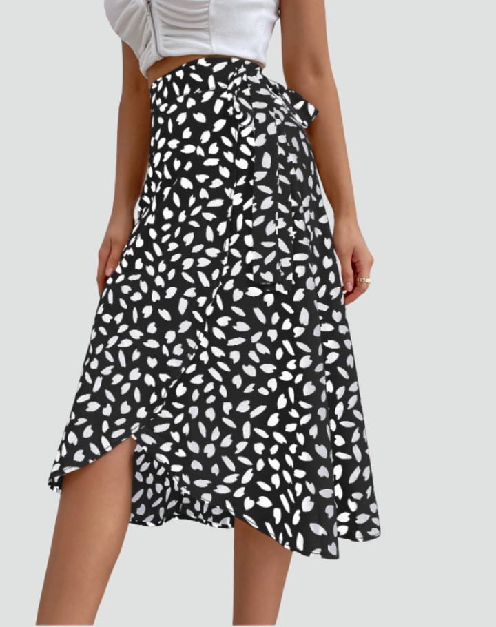 Zomerse midi wikkelrok met patronen en strikdetail