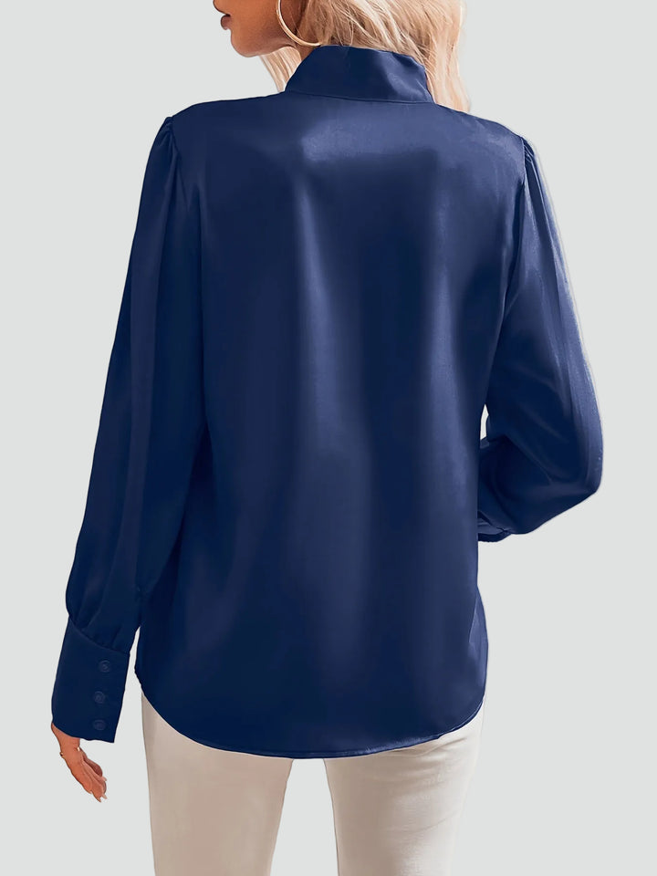 Elegancka damska bluzka z wiązaniem pod szyją i długim rękawem