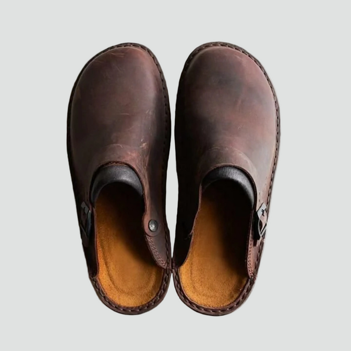 Leather clogs with buckle and closed toe for women