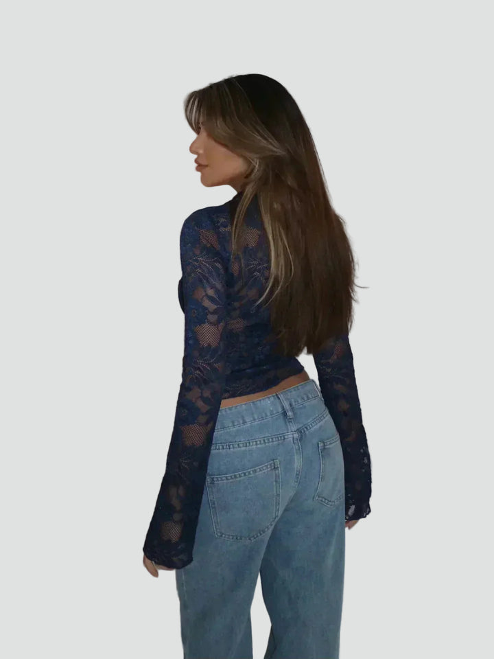 Lace blouse with a deep neckline and long sleeves
