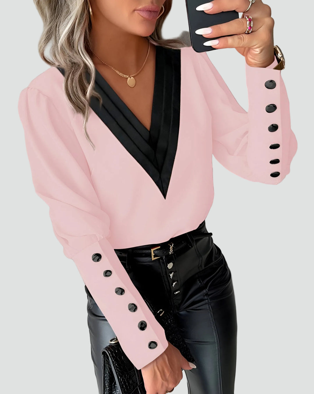 Blouse élégante pour femme avec col en V et boutons aux poignets