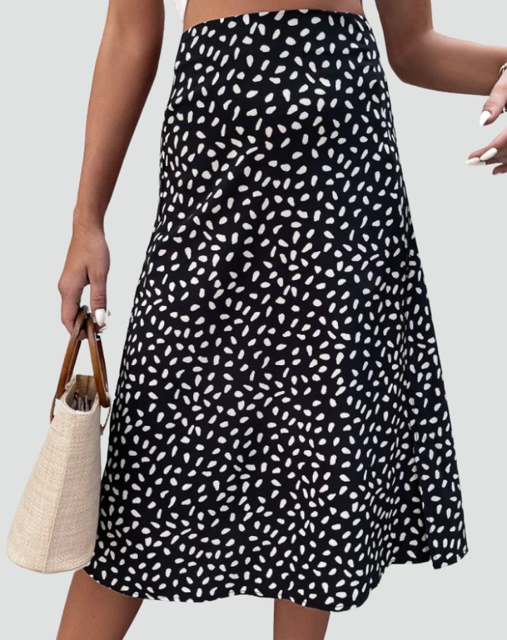 Zomerse midi wikkelrok met patronen en strikdetail