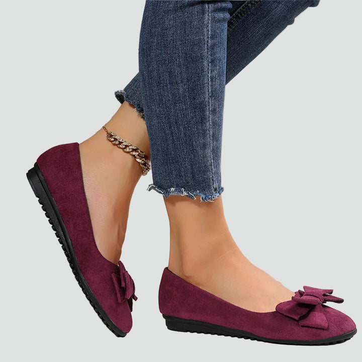 Women's ballet flats with a bow in a comfortable classic style