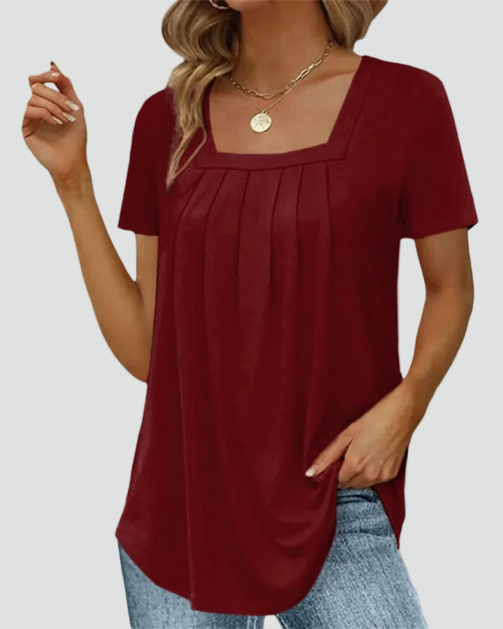 Loose women's blouse with square neckline and short sleeves