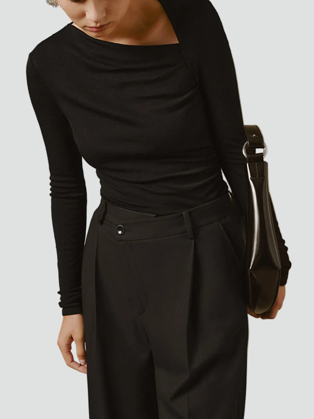 Women's asymmetrical fitted bodysuit with long sleeves