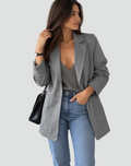 Elegante lange damesblazer met klassieke revers
