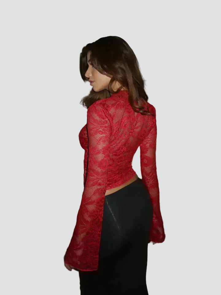 Lace blouse with a deep neckline and long sleeves