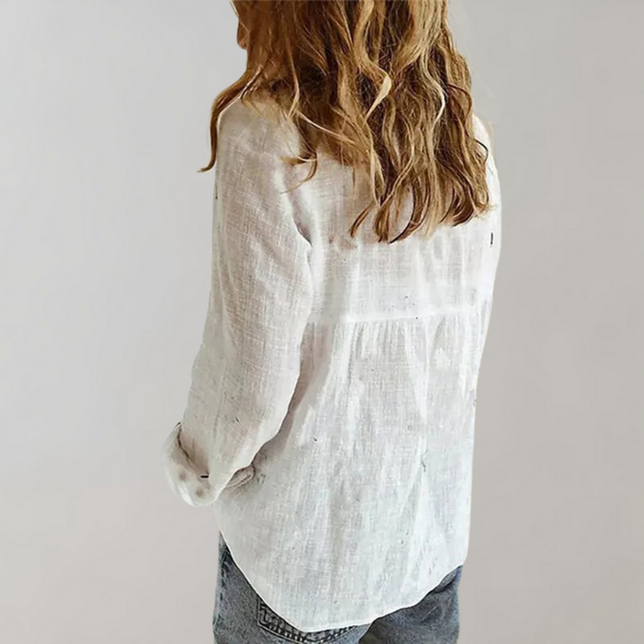 Losse damesslinnen blouse met knopen en V-hals