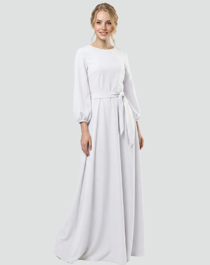 Elegancka biała długa sukienka wieczorowa maxi z kokardą