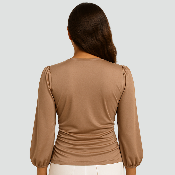 Elegancka damska bluzka z długim rękawem i dekoltem v dopasowana