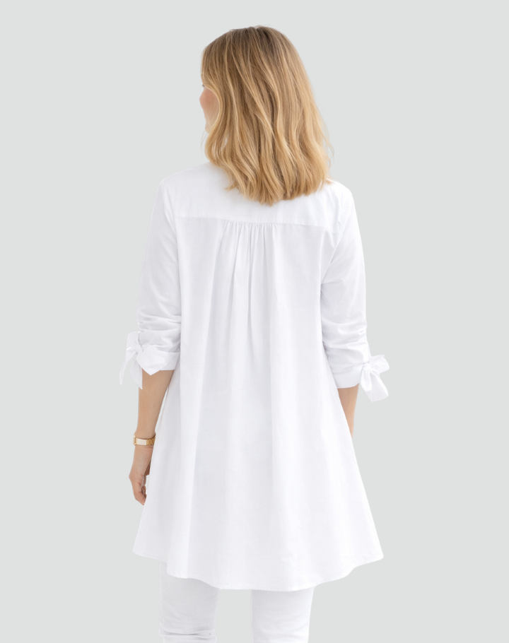 Elegant long oversized shirt with tied sleeves