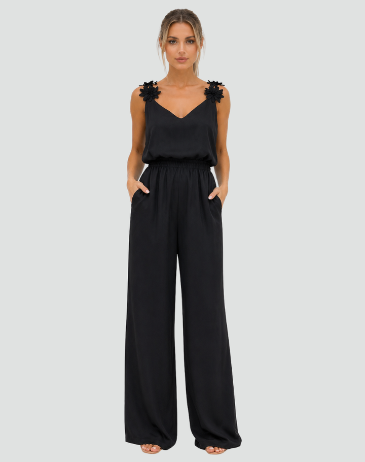 Elegant women's jumpsuit with wide legs and floral straps