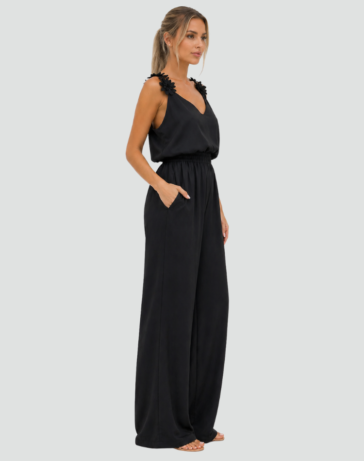 Elegant women's jumpsuit with wide legs and floral straps