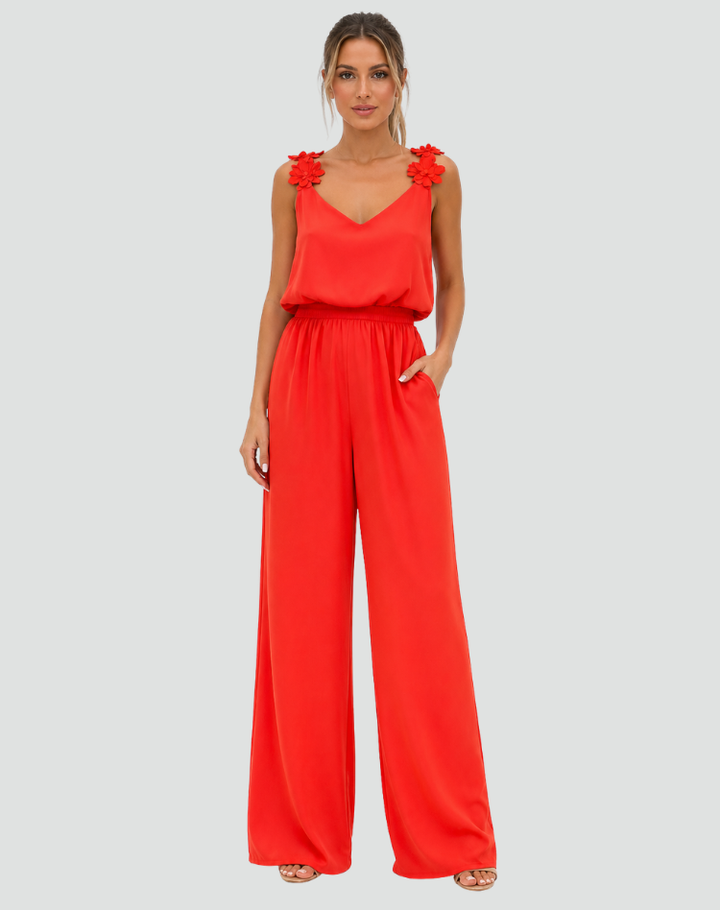 Elegant women's jumpsuit with wide legs and floral straps