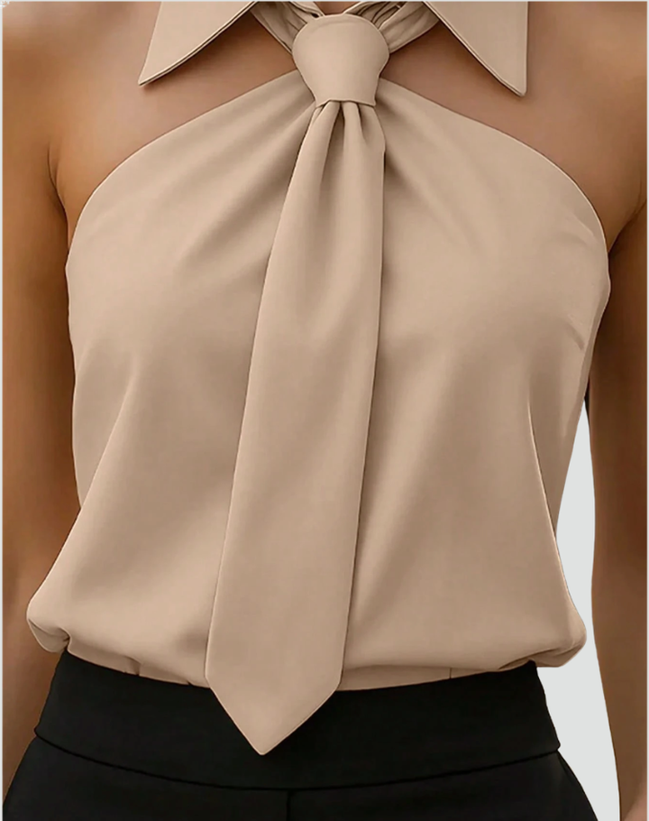 Elegant sleeveless women's top with collar and neck tie