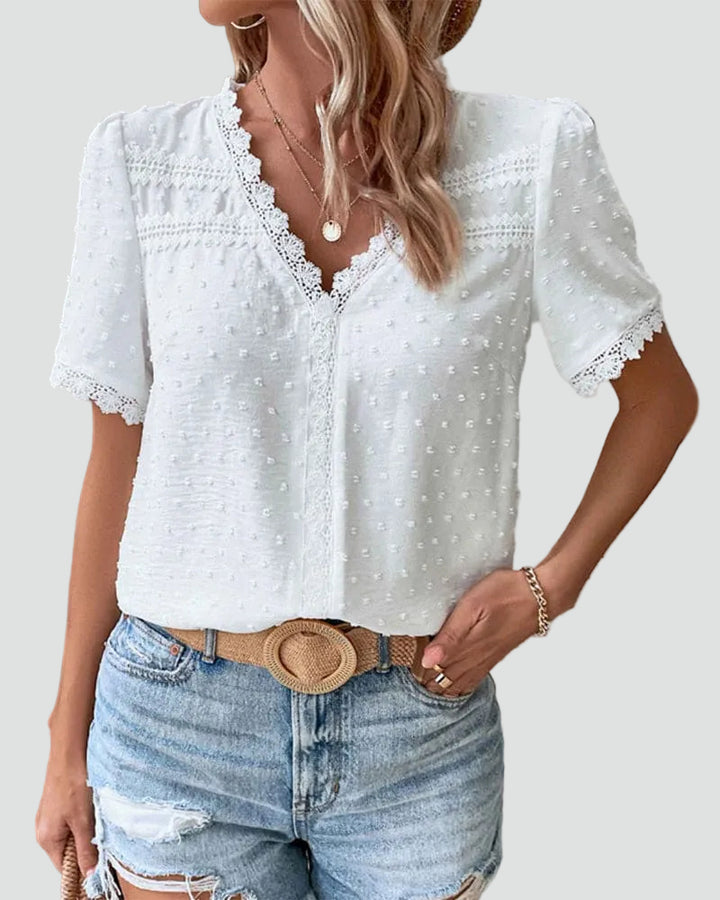 White elegant swiss dot blouse with lace and V-neckline