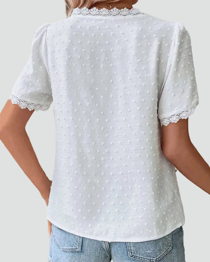 White elegant swiss dot blouse with lace and V-neckline