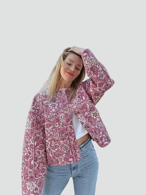 Short pink quilted women's jacket with floral pattern