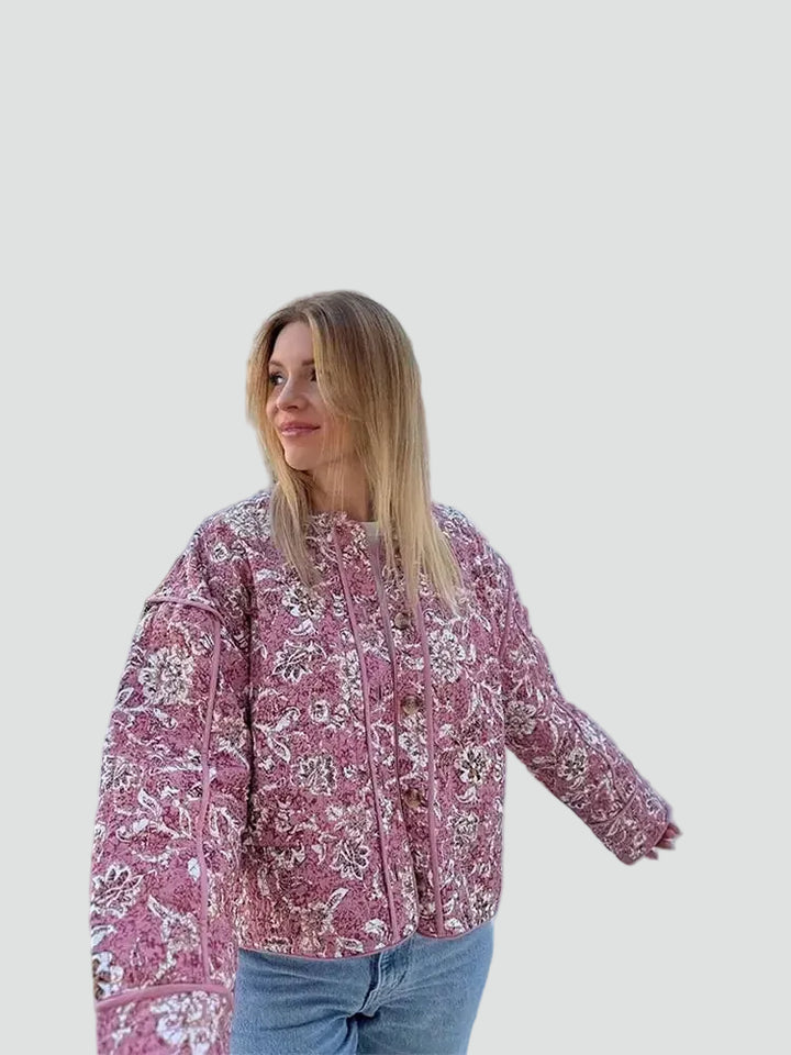 Short pink quilted women's jacket with floral pattern