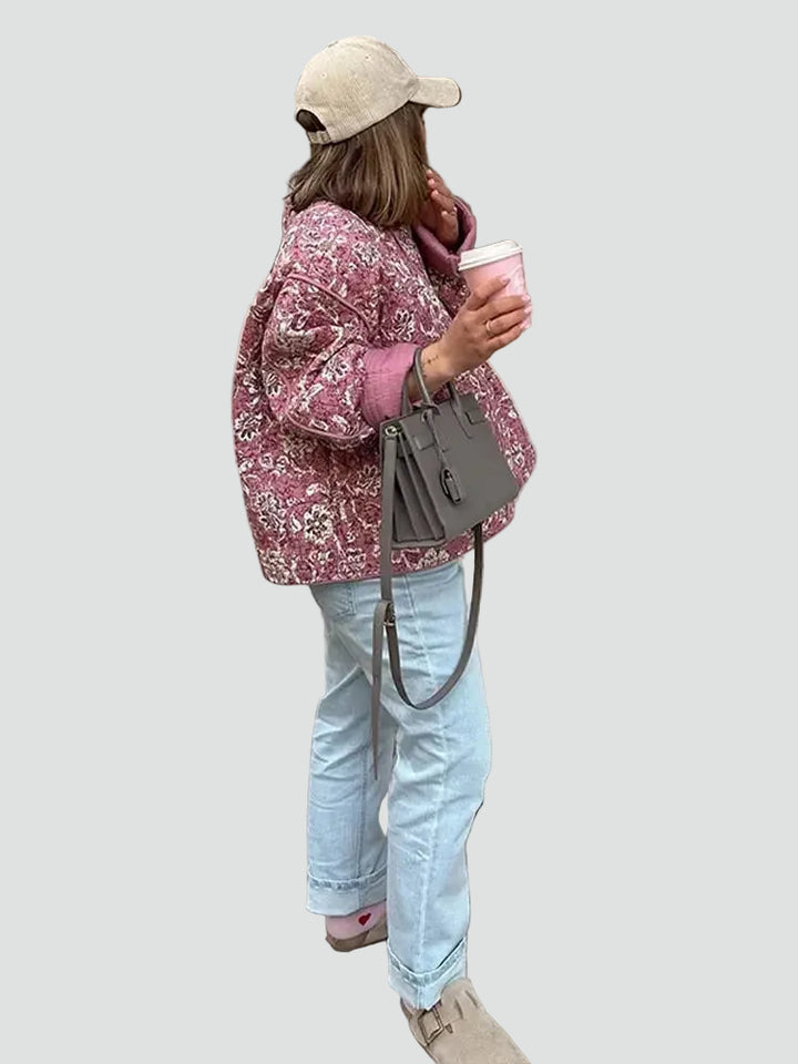 Short pink quilted women's jacket with floral pattern