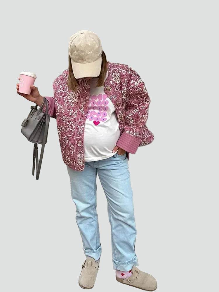 Short pink quilted women's jacket with floral pattern