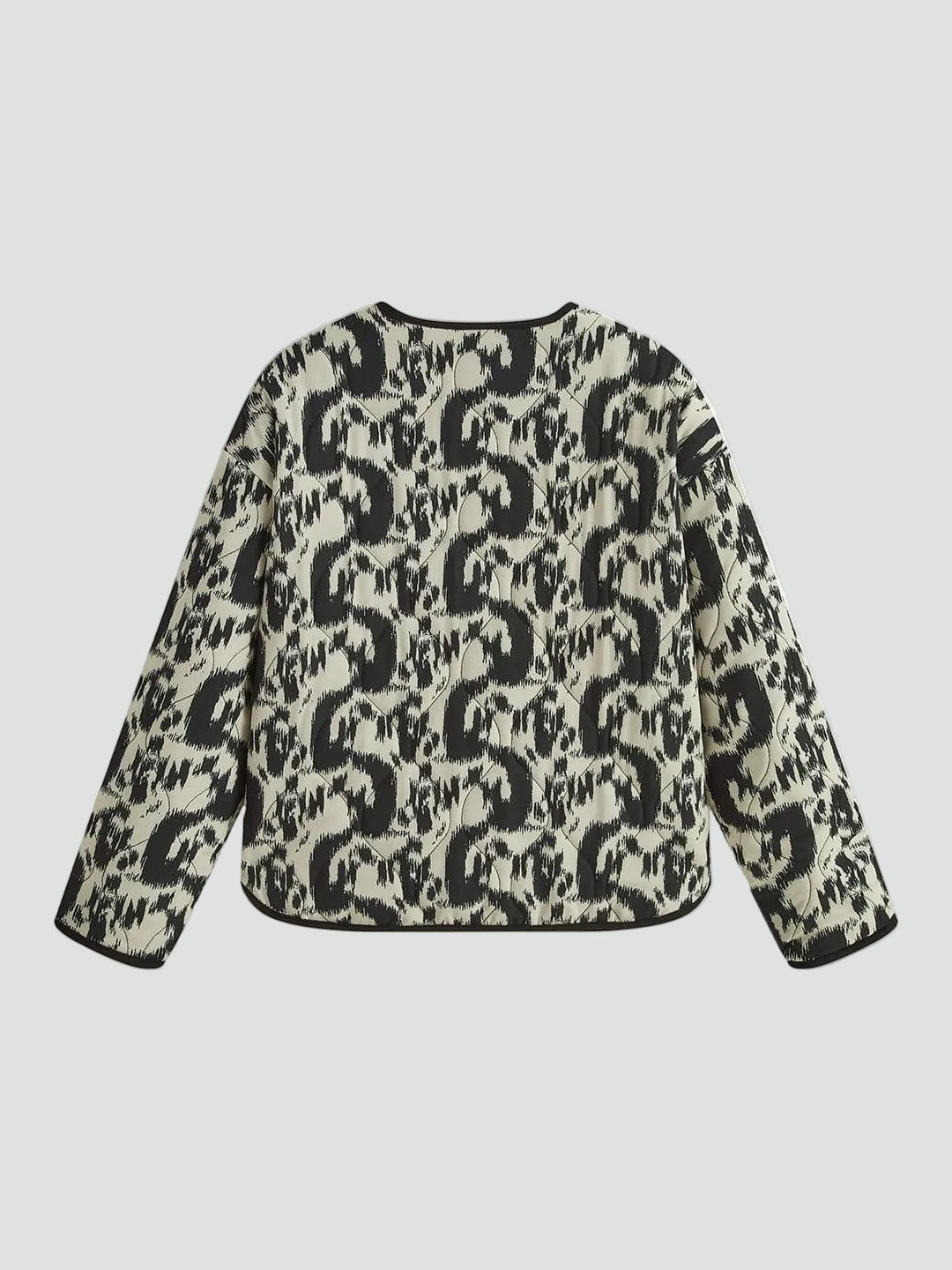 Patterned quilted jacket without collar with decorative trim