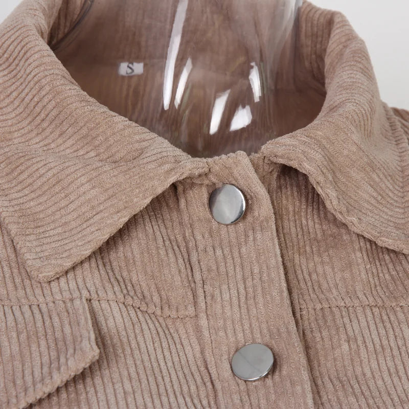 Short women's corduroy jacket with puff sleeves and pockets